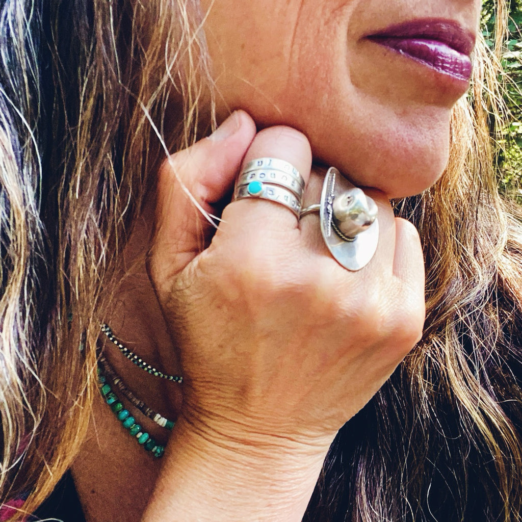 Close-up of Amy wearing Ten Gallon Cowboy Hat Ring in Silver
